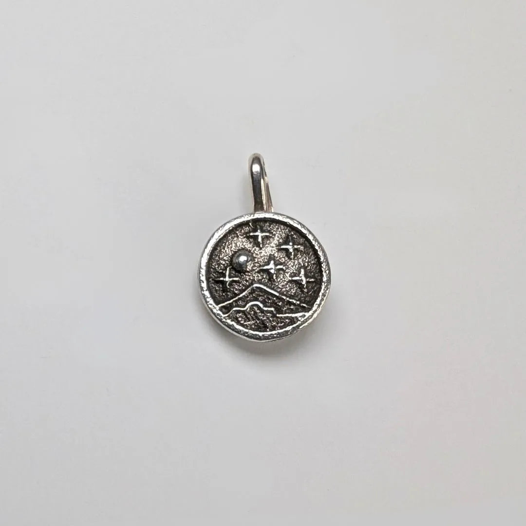 "Desert Night" Sterling Silver Charm Pendant with Turquoise. Front view